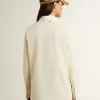 Camicia da donna in cotone color crema con ricami floreali Camicia da donna in cotone color crema con ricami floreali
