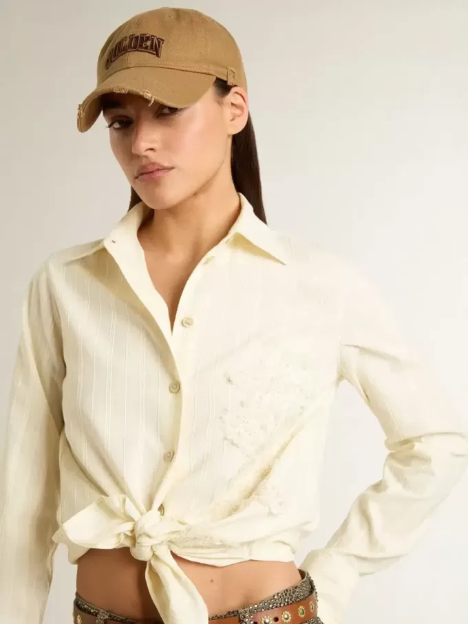 Camicia da donna in cotone color crema con ricami floreali Camicia da donna in cotone color crema con ricami floreali