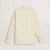 Camicia da donna in cotone color crema con ricami floreali Camicia da donna in cotone color crema con ricami floreali