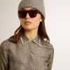 Camicia da donna in misto viscosa e seta verde con motivo floreale Camicia da donna in misto viscosa e seta verde con motivo floreale