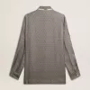Camicia da donna in misto viscosa e seta verde con motivo floreale Camicia da donna in misto viscosa e seta verde con motivo floreale