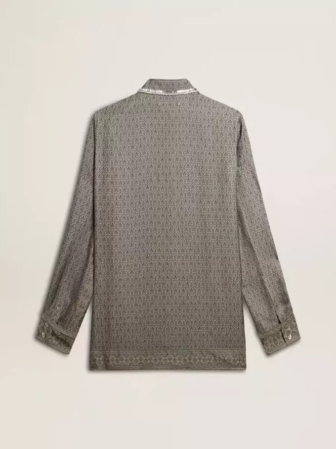 Camicia da donna in misto viscosa e seta verde con motivo floreale Camicia da donna in misto viscosa e seta verde con motivo floreale