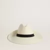 Cappello fedora dorato in paglia bianca con nastro nero e stampa marina sotto la tesa