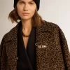 Cappotto da donna monopetto in lana con motivo jacquard Cappotto da donna monopetto in lana con motivo jacquard
