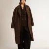 Cappotto da donna monopetto in lana con motivo jacquard Cappotto da donna monopetto in lana con motivo jacquard