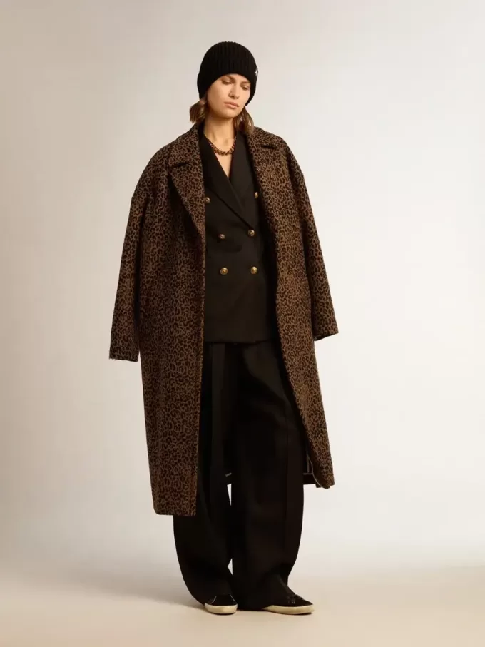 Cappotto da donna monopetto in lana con motivo jacquard Cappotto da donna monopetto in lana con motivo jacquard