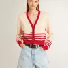 Cardigan da donna color crema con strisce rosse Cardigan da donna color crema con strisce rosse