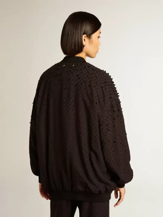Cardigan nero da donna con ricami sfumati Cardigan nero da donna con ricami sfumati