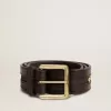 Cintura da donna nera in pelle lavata con borchie dorate