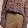 Cintura da donna nera in pelle lavata con borchie dorate
