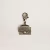 Ciondolo a forma di borsellino in ottone color argento con cristalli