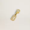 Ciondolo a forma di lettera D in ottone dorato con cristalli Ciondolo a forma di lettera D in ottone dorato con cristalli