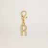 Ciondolo a forma di lettera R in ottone color oro con cristalli