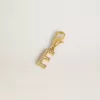 Ciondolo lettera E in ottone color oro con cristalli