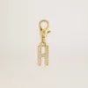 Ciondolo lettera H in ottone dorato con cristalli Ciondolo lettera H in ottone dorato con cristalli
