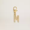 Ciondolo lettera M in ottone dorato con cristalli Ciondolo lettera M in ottone dorato con cristalli