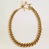Collana con catena decrescente in oro antico e chiusura a forma di stella