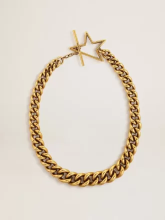 Collana con catena decrescente in oro antico e chiusura a forma di stella