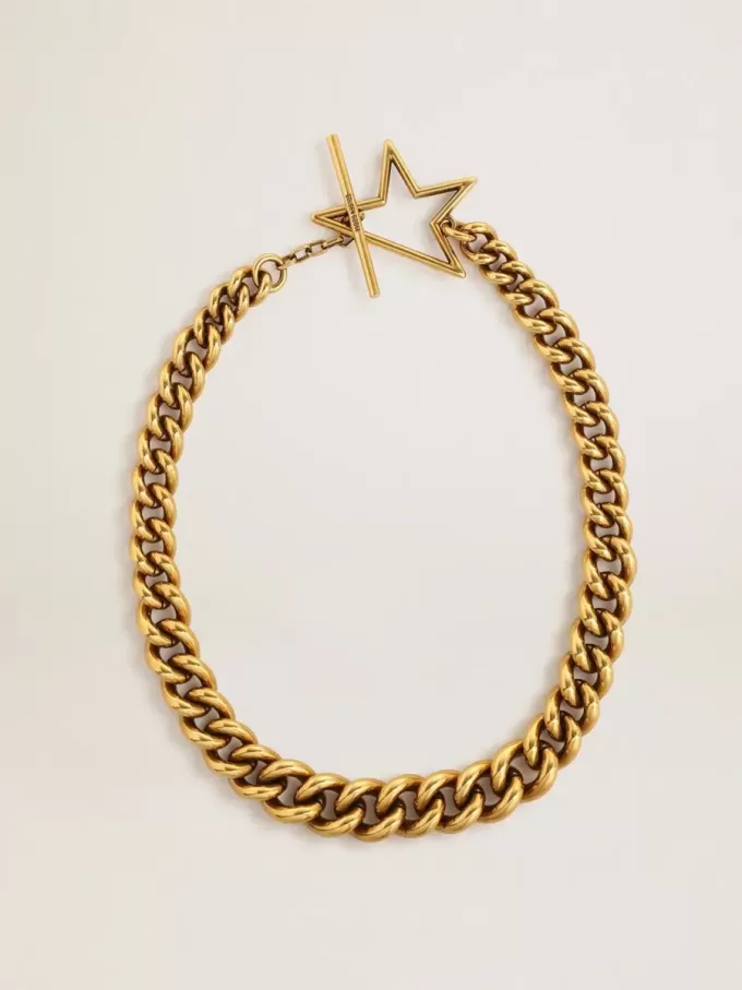 Collana con catena decrescente in oro antico e chiusura a forma di stella