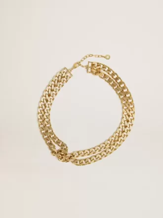 Collana con catena intrecciata color oro antico e chiusura a forma di stella