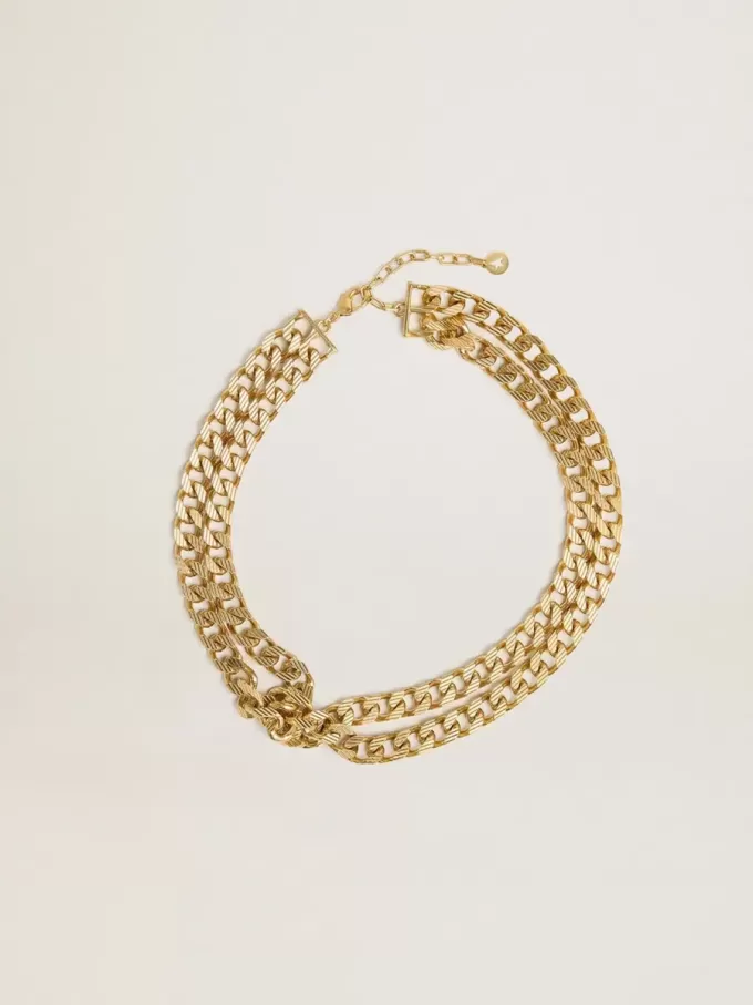 Collana con catena intrecciata color oro antico e chiusura a forma di stella