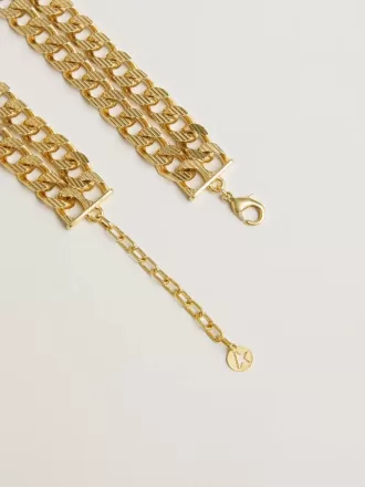 Collana con catena intrecciata color oro antico e chiusura a forma di stella
