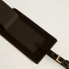 Etichetta per bagagli nera