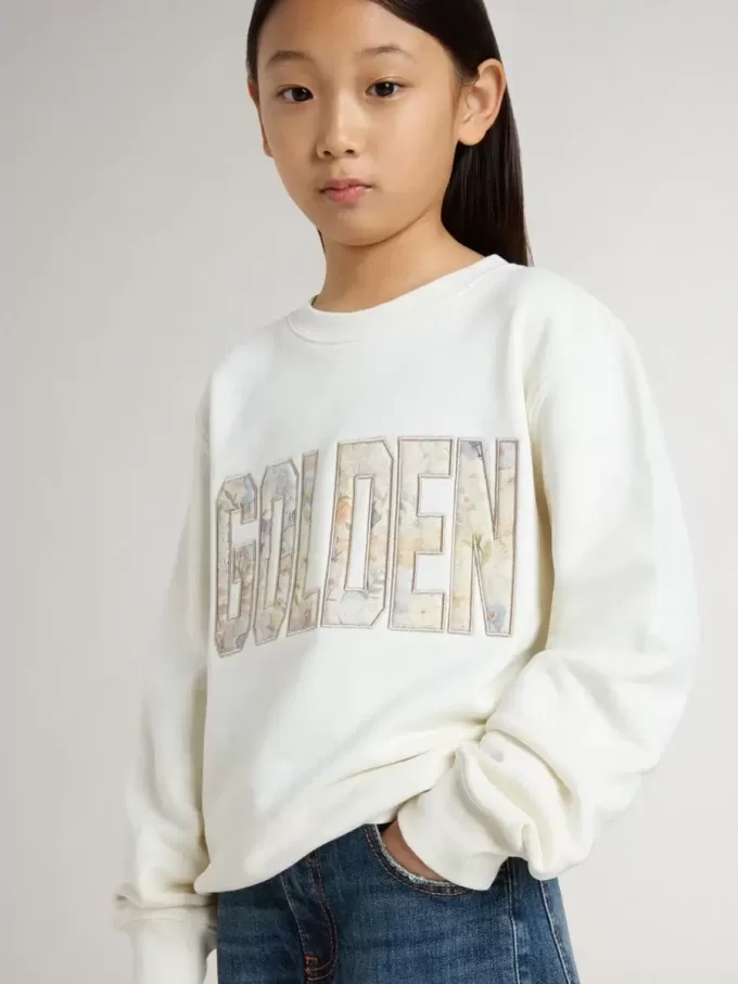 Felpa bianca da bambina con scritta multicolore Golden sul davanti Felpa bianca da bambina con scritta multicolore Golden sul davanti