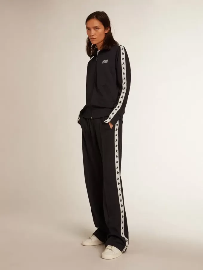Felpa blu scuro con zip, striscia bianca e stelle a contrasto Felpa blu scuro con zip, striscia bianca e stelle a contrasto