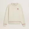 Felpa CNY in cotone bianco consumato con ricami rossi