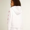 Felpa con zip da bambina in bianco con stelle glitterate sulle maniche