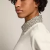 Felpa con zip Denise Star Collection in bianco papiro con collo in cristallo