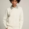 Felpa con zip Denise Star Collection in bianco papiro con collo in cristallo