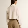 Felpa corta da donna in cotone color crema con cristalli sul davanti