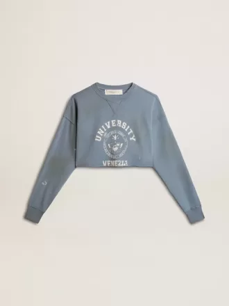 Felpa corta in azzurro con finitura effetto consumato