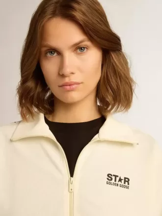 Felpa da donna bianca con zip, striscia bianca e stelle nere