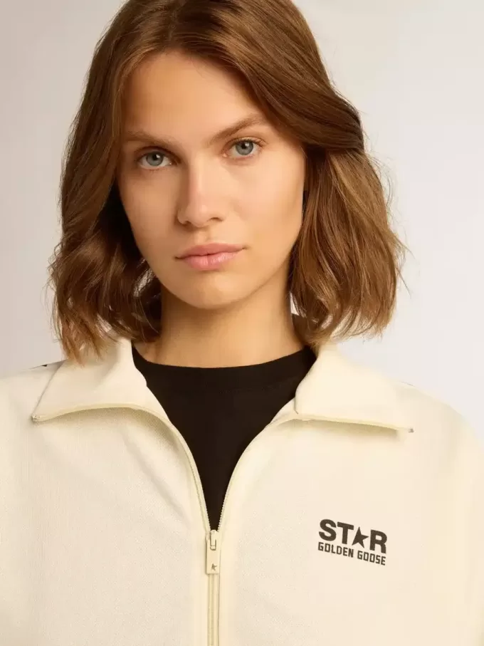 Felpa da donna bianca con zip, striscia bianca e stelle nere Felpa da donna bianca con zip, striscia bianca e stelle nere