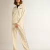 Felpa da donna bianca con zip, striscia bianca e stelle nere Felpa da donna bianca con zip, striscia bianca e stelle nere