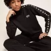 Felpa da donna nera con zip e stelle bianche