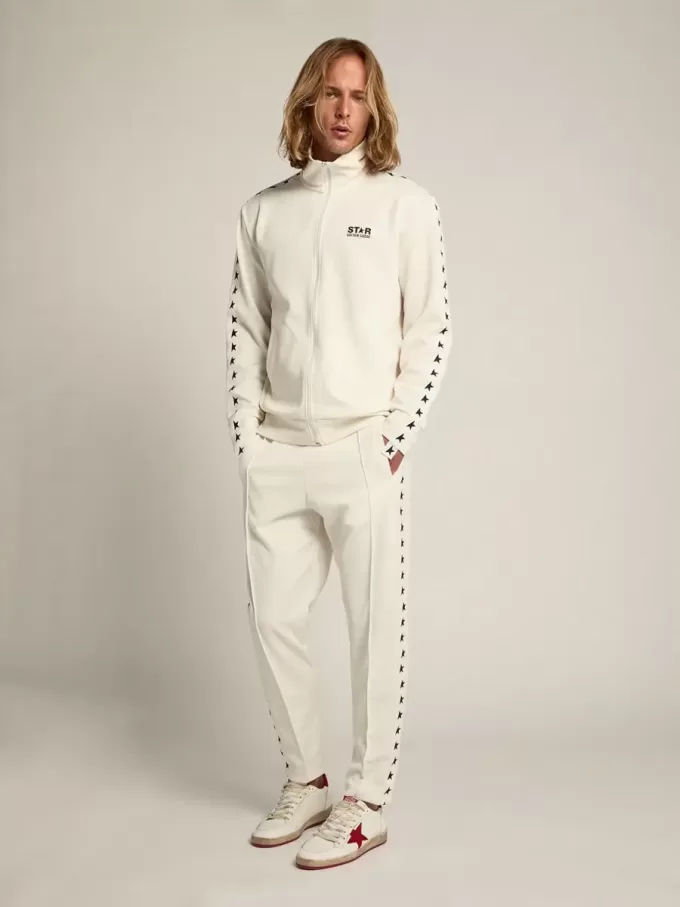 Pantaloni jogging da uomo bianchi con stelle nere sui lati Pantaloni jogging da uomo bianchi con stelle nere sui lati