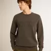 Felpa grigia da uomo con logo e trattamento effetto consumato Felpa grigia da uomo con logo e trattamento effetto consumato