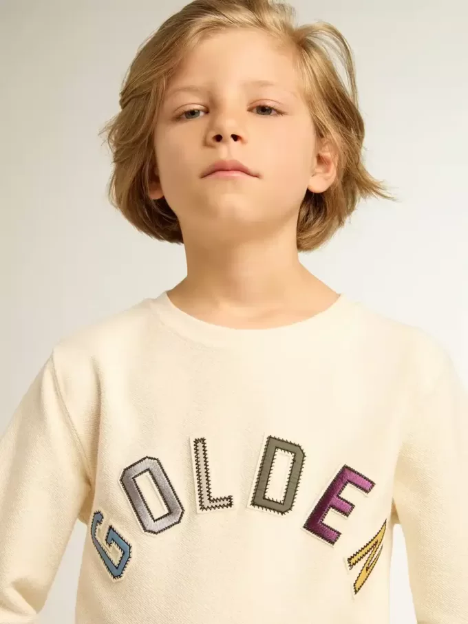 Felpa in bianco invecchiato con scritta multicolore Golden sul davanti Felpa in bianco invecchiato con scritta multicolore Golden sul davanti