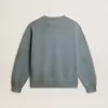 Felpa oversize in azzurro con finitura effetto consumato