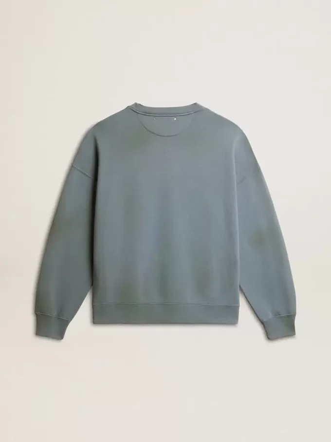 Felpa oversize in azzurro con finitura effetto consumato