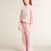 Felpa rosa con maxi stella in glitter argento sul davanti Felpa rosa con maxi stella in glitter argento sul davanti