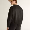 Felpa unisex in cotone nero consumato con ricamo del logo