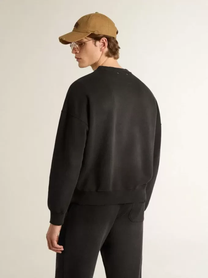 Felpa unisex in cotone nero consumato con ricamo del logo