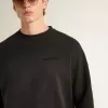 Felpa unisex in cotone nero consumato con ricamo del logo