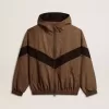 Giacca a vento in beige e nero pied-de-poule Giacca a vento in beige e nero pied-de-poule