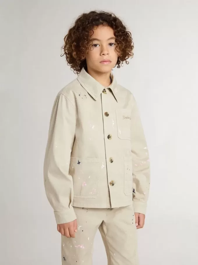 Giacca beige per bambino con spruzzi multicolori